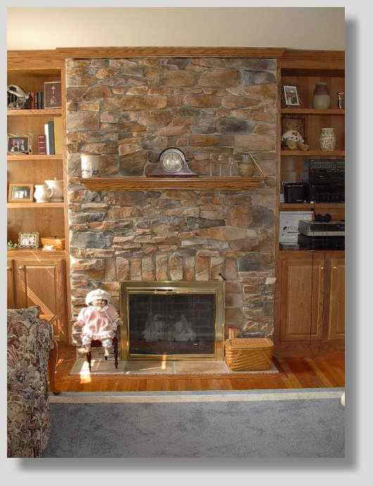 Cultured stone facing mantal and built ins
